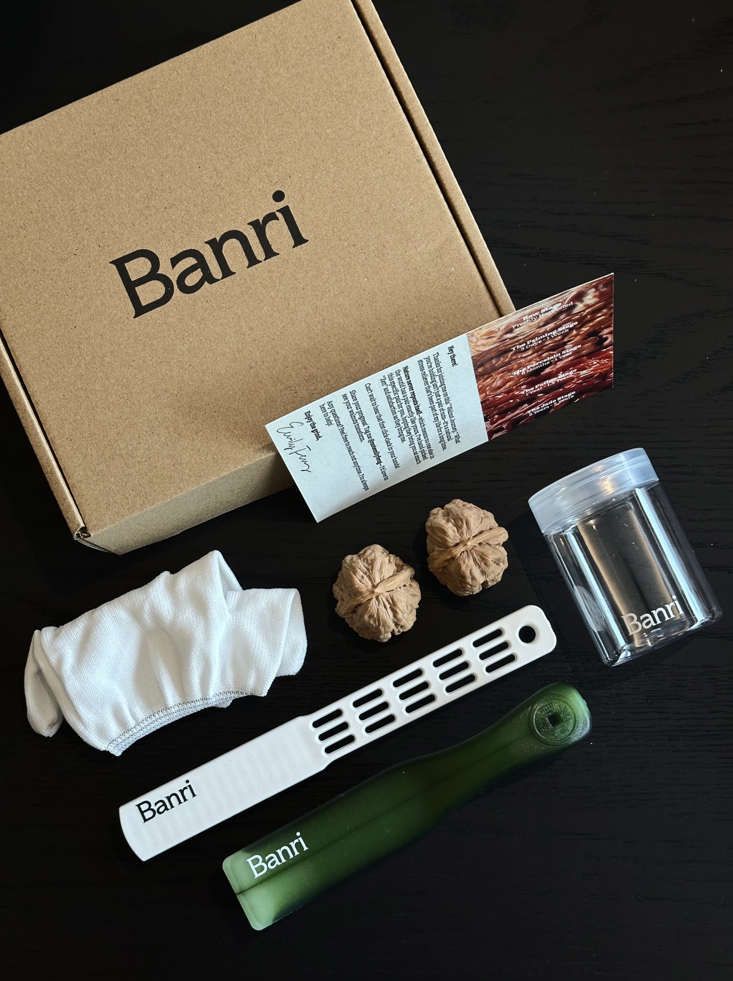 Complete Banri premium Wenwan walnut advanced kit with rare collector walnuts, professional brushes, and storage jar.